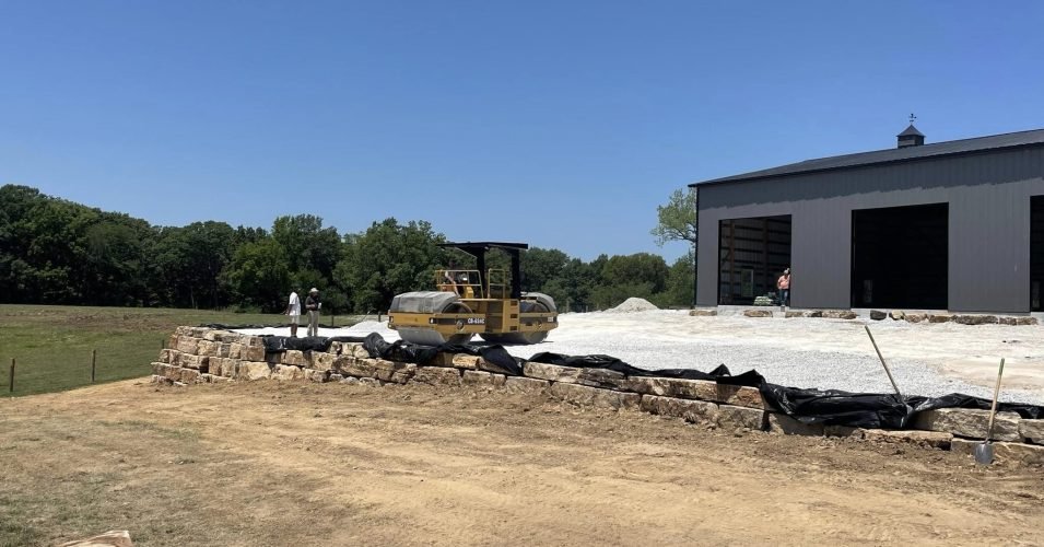 Professional excavation and retaining wall installation for outdoor living space in O’Fallon Missouri
